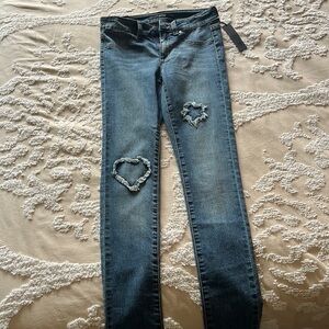 Young girl, size 14 Joe’s Ultra Slim fit denim jeans.
